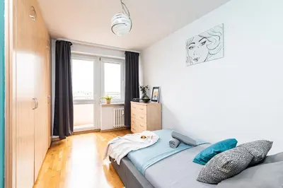 Łóżko lub łóżka w pokoju w obiekcie SuperApart Dolna 4 - Blisko Łazienek Królewskich