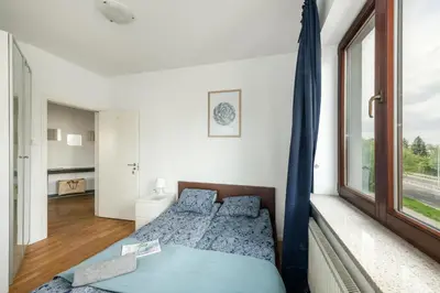 Łóżko lub łóżka w pokoju w obiekcie Waw pokoje Wilanów