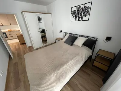 Łóżko lub łóżka w pokoju w obiekcie NEWPORT Industrial Apartment
