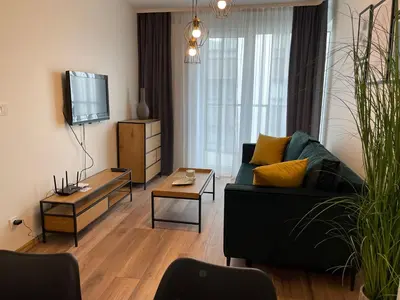 Telewizja i/lub zestaw kina domowego w obiekcie NEWPORT Industrial Apartment
