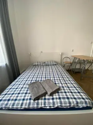 Łóżko lub łóżka w pokoju w obiekcie Pokoje gościnne na Lwowskiej