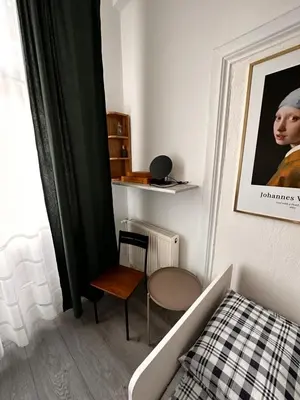 Łóżko lub łóżka w pokoju w obiekcie Pokoje gościnne na Lwowskiej