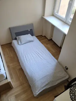 Łóżko lub łóżka w pokoju w obiekcie Your Apart Powiśle Fabryczna Warszawa