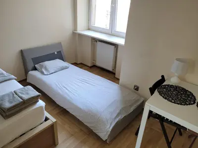 Łóżko lub łóżka w pokoju w obiekcie Your Apart Powiśle Fabryczna Warszawa