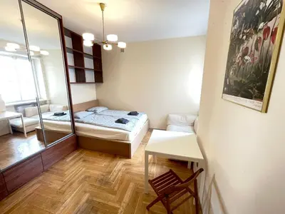 Łóżko lub łóżka w pokoju w obiekcie Your Apart Powiśle Fabryczna Warszawa
