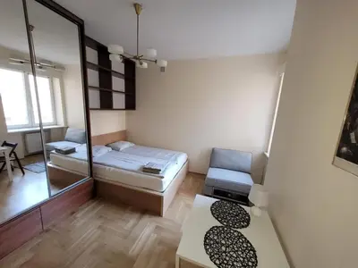 Łóżko lub łóżka w pokoju w obiekcie Your Apart Powiśle Fabryczna Warszawa