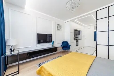 Telewizja i/lub zestaw kina domowego w obiekcie Luksusowy apartament z tarasem Centrum Warszawy