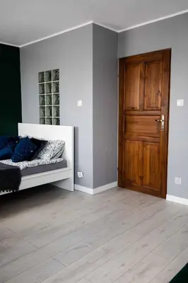 Łóżko lub łóżka w pokoju w obiekcie Apartament Miki