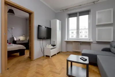 Telewizja i/lub zestaw kina domowego w obiekcie Grójecka Stara Ochota Apartment by BookingHost