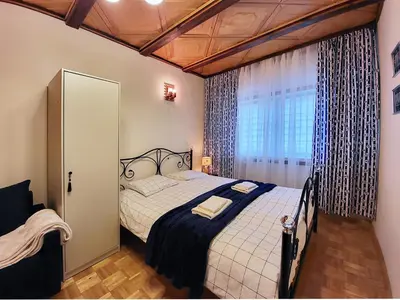 Łóżko lub łóżka w pokoju w obiekcie HUSARSKA 60