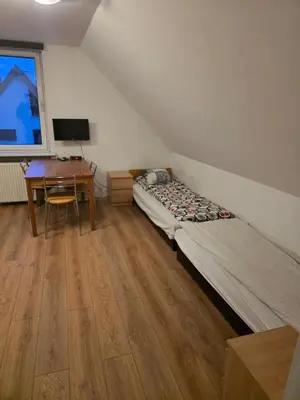 Łóżko lub łóżka w pokoju w obiekcie Marymont