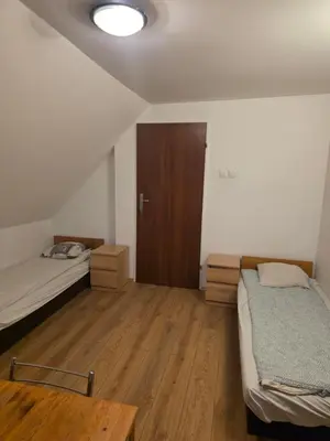 Łóżko lub łóżka w pokoju w obiekcie Marymont