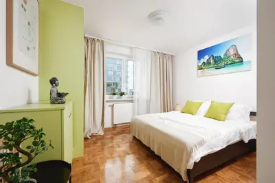 Łóżko lub łóżka w pokoju w obiekcie Lumina spacious apartment near the Warszawa Zachodnia station