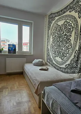 Łóżko lub łóżka w pokoju w obiekcie Apartament Przy Metrze i Przy Lesie