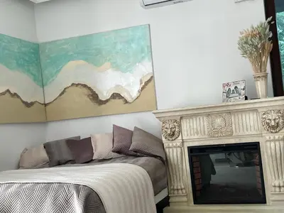 Łóżko lub łóżka w pokoju w obiekcie Uroczy apartament 2 osobne pokoje Marina Royal Palace