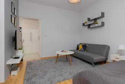 Telewizja i/lub zestaw kina domowego w obiekcie Kolejowa Apartments Warsaw by Noclegi Renters