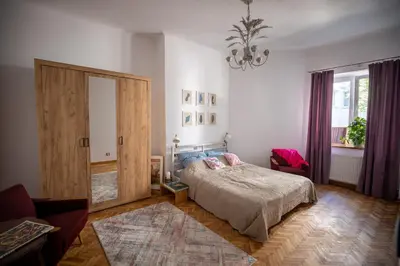 Łóżko lub łóżka w pokoju w obiekcie Warsaw Concierge Miedziana