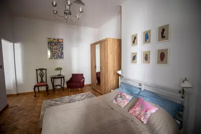 Łóżko lub łóżka w pokoju w obiekcie Warsaw Concierge Miedziana