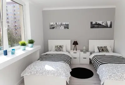 Łóżko lub łóżka w pokoju w obiekcie Warsawrent Hit Apartments