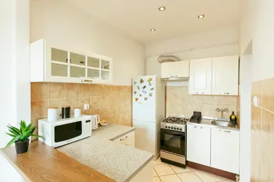 Kuchnia lub aneks kuchenny w obiekcie Plac Konstytucji 6 Grey - Bezpłatny garaż podziemny - Free Parking - Apartament dla 4 osób