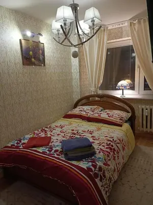 Łóżko lub łóżka w pokoju w obiekcie Świętokrzyska