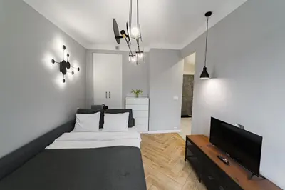 Telewizja i/lub zestaw kina domowego w obiekcie Apartament w Centrum Warszawy - Dworzec Centralny
