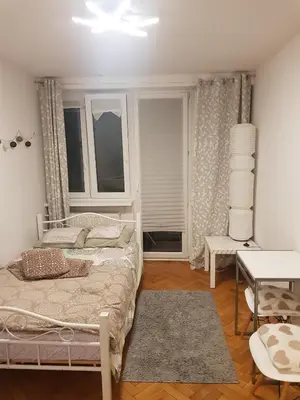 Łóżko lub łóżka w pokoju w obiekcie Apartament Plac Trzech Krzyży
