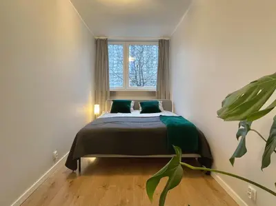 Łóżko lub łóżka w pokoju w obiekcie Apartament przy Atrium, stacja metra Rondo ONZ