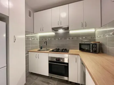 Kuchnia lub aneks kuchenny w obiekcie Apartament przy Atrium, stacja metra Rondo ONZ