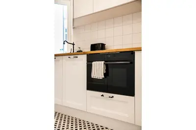 Kuchnia lub aneks kuchenny w obiekcie Premium Warsaw Center Studio by BookingHost
