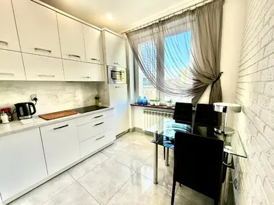 Kuchnia lub aneks kuchenny w obiekcie TOP CLASS metro fast WiFi 100 Mbs 70’TV Netflix HBO Max Disney+ AppleTV+