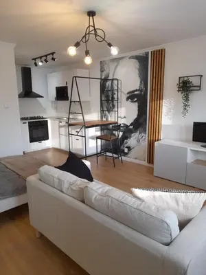 Telewizja i/lub zestaw kina domowego w obiekcie Apartament Ogrodowa Studio Warszawa