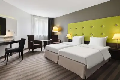 Łóżko lub łóżka w pokoju w obiekcie Radisson Blu Sobieski