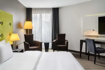 Łóżko lub łóżka w pokoju w obiekcie Radisson Blu Sobieski