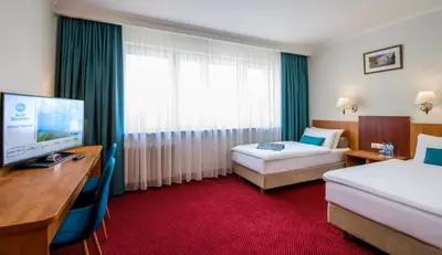 Łóżko lub łóżka w pokoju w obiekcie Best Western Hotel Portos