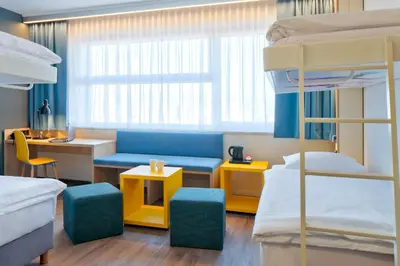 Łóżko lub łóżka w pokoju w obiekcie o3Hotel
