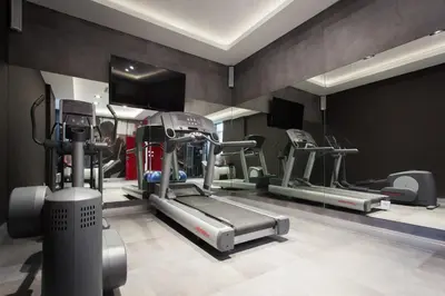Centrum fitness w obiekcie Mamaison Residence Diana