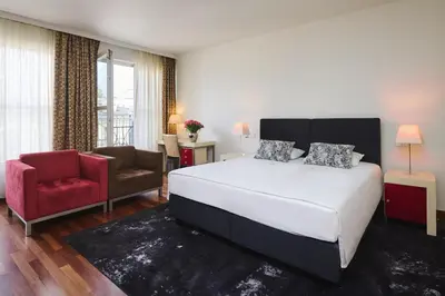 Łóżko lub łóżka w pokoju w obiekcie Mamaison Residence Diana