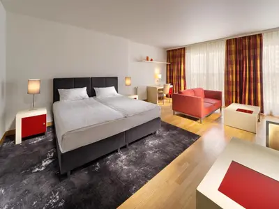 Łóżko lub łóżka w pokoju w obiekcie Mamaison Residence Diana