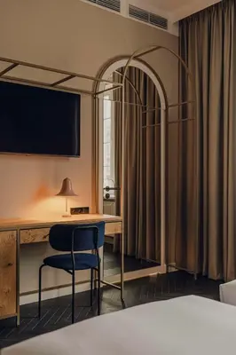 Łóżko lub łóżka w pokoju w obiekcie Flaner Hotel, WorldHotels Crafted