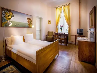 Łóżko lub łóżka w pokoju w obiekcie Chopin Boutique