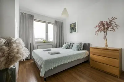 Łóżko lub łóżka w pokoju w obiekcie Gama Home Wyspowa 1