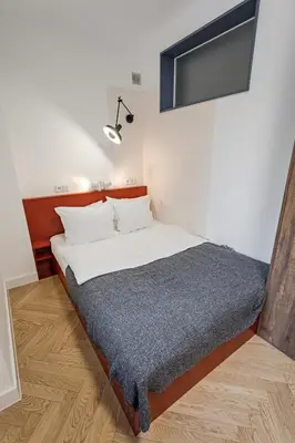 Łóżko lub łóżka w pokoju w obiekcie EMILY STUDIO