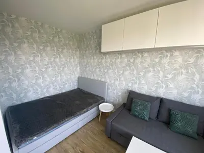 Część wypoczynkowa w obiekcie Brand New Top Floor Apartment at Mokotow