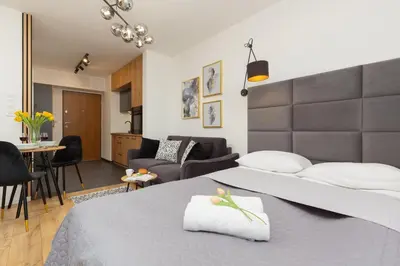 Część wypoczynkowa w obiekcie Warsaw Praga Kokoryczki Apartments with Parking by Noclegi Renters