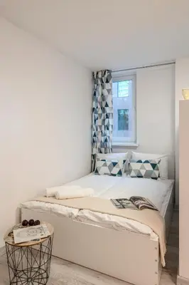 Łóżko lub łóżka w pokoju w obiekcie ShortStayPoland Śliska (B88)