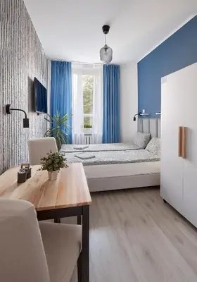 Łóżko lub łóżka w pokoju w obiekcie Tatamka Hostel