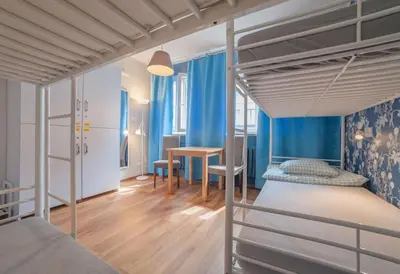 Łóżko lub łóżka w pokoju w obiekcie Tatamka Hostel