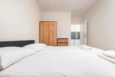 Łóżko lub łóżka w pokoju w obiekcie Przeworska 9A by Homeprime