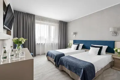 Łóżko lub łóżka w pokoju w obiekcie Hotel Witkowski Warsaw Airport